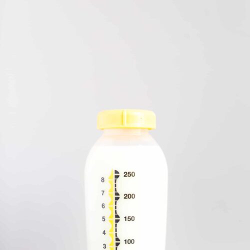 Pumped breastmilk in milk storage bottle